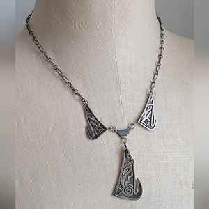 Vintage sterling silver Navajo necklace with 3 coyotes. Marked EB